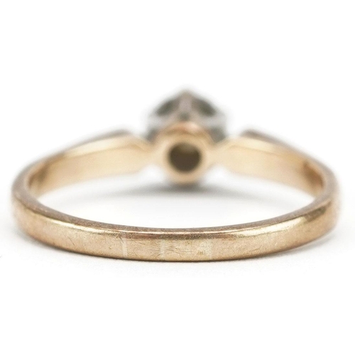 3068 - A 9ct gold diamond solitaire ring, the diamond approximately 3.0mm in diameter, size N/O, 2.4g.