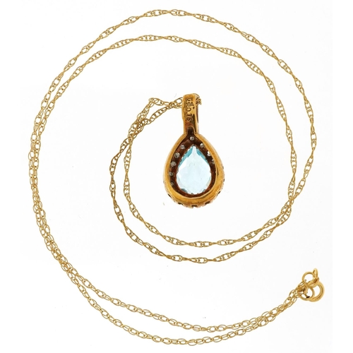 3047 - A 9ct gold blue topaz and diamond teardrop pendant on a 9ct gold necklace, 1.9cm high and 44cm in le... 