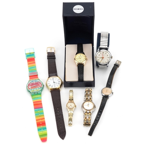 3319 - A group of various gentlemen's and ladies wristwatches to include Sekonda, Swatch, Wirz and Yeoman.