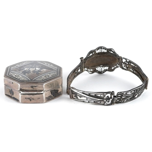 492 - A .800 silver box and filigree bracelet each with engraved decoration, box width 4.7cm.