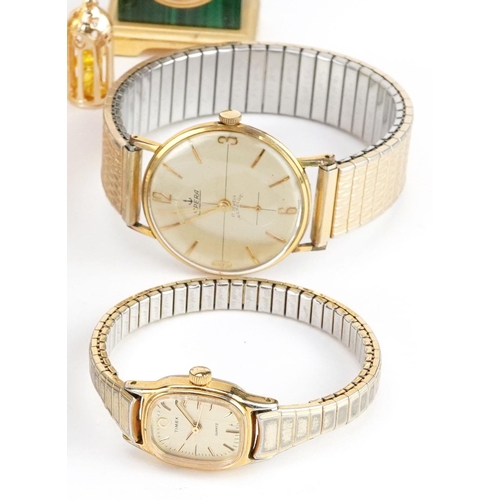 3338 - A collection of miniature gilt brass clocks and wristwatches including Accurist, Limit and Harrods.