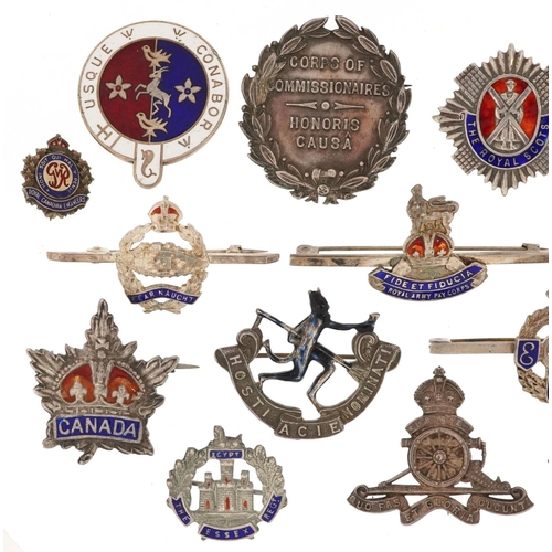 2460 - A collection of military interest silver sweetheart badges, some with enamel, including Egypt East L... 