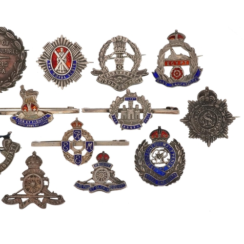 2460 - A collection of military interest silver sweetheart badges, some with enamel, including Egypt East L... 