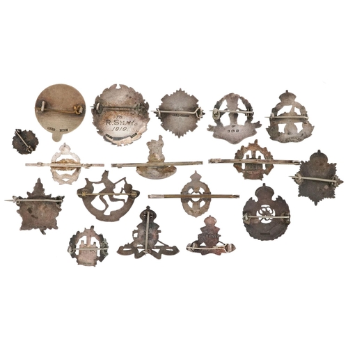 2460 - A collection of military interest silver sweetheart badges, some with enamel, including Egypt East L... 