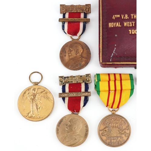 2435 - A collection of military interest medals and medallions including two British military World War I m... 