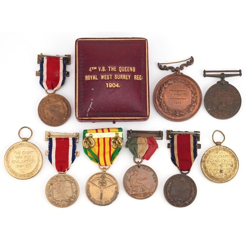 2435 - A collection of military interest medals and medallions including two British military World War I m... 