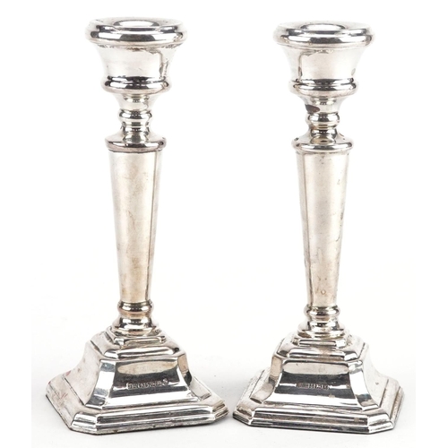 418 - John Bull Ltd, a pair of Elizabeth II silver tapering candlesticks, Birmingham 1997, 15cm high, tota... 