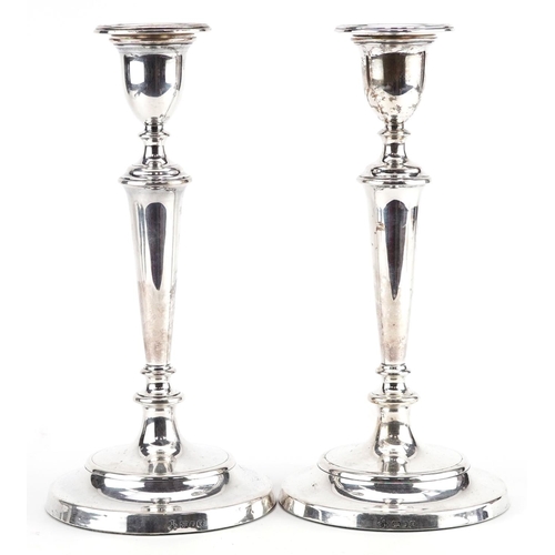 405 - M C Hersey & Son Ltd, a pair of large Elizabeth II silver tapering candlesticks with circular bases,... 