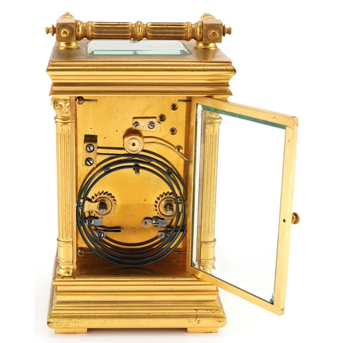 60 - A good early 20th century French gilt metal brass repeating carriage clock, the white enamel dial wi... 