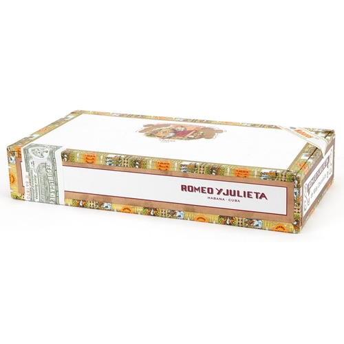 78 - A sealed box of twenty five Romeo Y Julietta Habana wide Churchill's cigars.