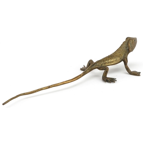 1440 - A 20th century cast gilt metal figure of Gekko, L-34cm.