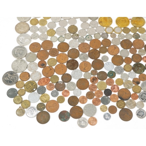 2130 - British and world coins including silver examples to include a patina double florin collection in a ... 