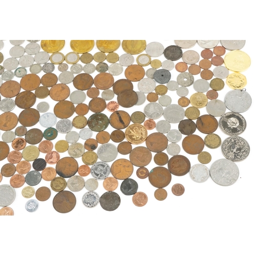 2130 - British and world coins including silver examples to include a patina double florin collection in a ... 