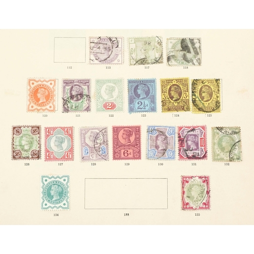 2219 - An album page of Victorian stamps to include two five shillings, two ten shillings and 1887 Jubilee ... 