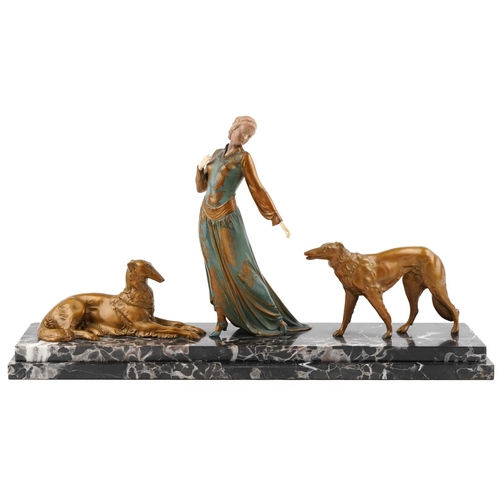 Roggia - A French Art Deco bronze and painted figure group of a lady with two dogs on a black marble stepped plinth base, 42cm H x 77cm L x 19cm W.