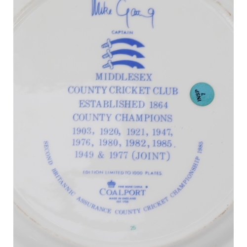 2348 - A group of items relating to Middlesex County Cricket Club to include two jackets, four Coalport pla... 