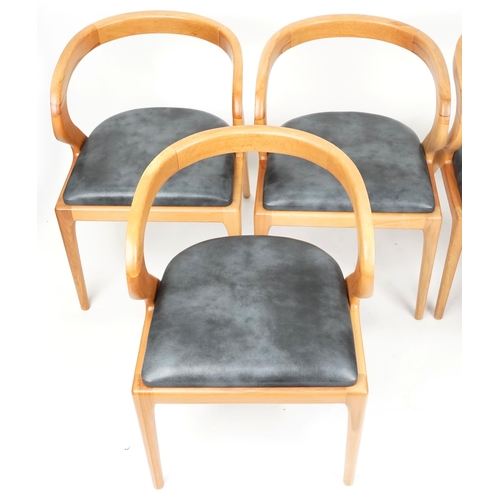 1015 - A set of six modern Nana solid ash dining chairs, with grey leather overstuffed seats, raise on tape... 