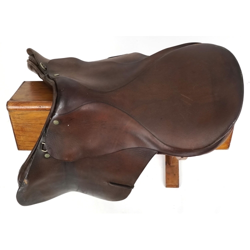 1147 - An F.E. Gibson Saddler Ltd brown leather 17 inch saddle.