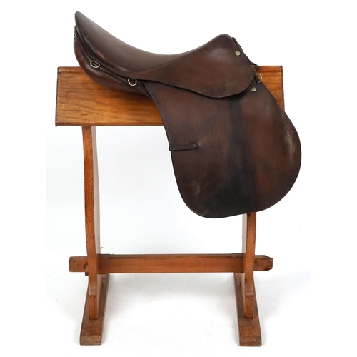 1147 - An F.E. Gibson Saddler Ltd brown leather 17 inch saddle.