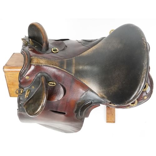 1149 - A large dark brown leather 18.5 inch saddle.