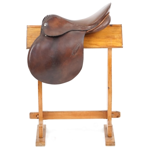 1153 - A Springtree brown leather saddle 17 inch saddle.