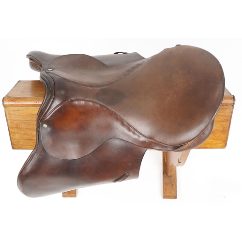 1153 - A Springtree brown leather saddle 17 inch saddle.