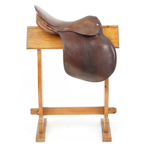 1153 - A Springtree brown leather saddle 17 inch saddle.