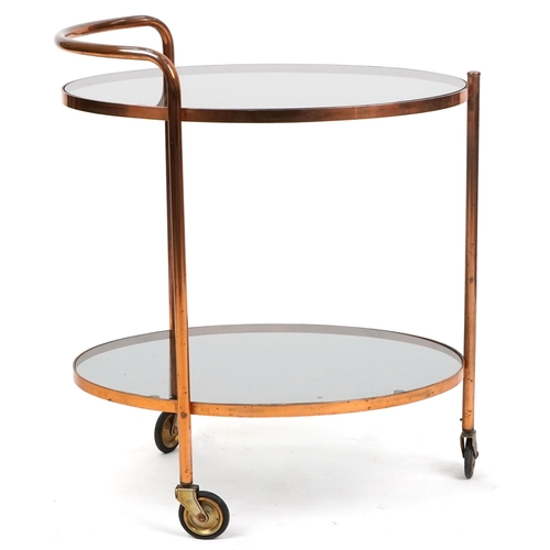 1106 - A mid 20th century two tier tea trolley with smokey glass, H-73cm W-62cm