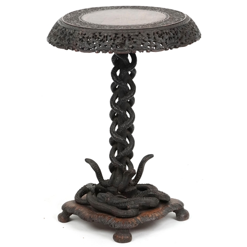  A good 19th century Anglo-Indian carved paddock tip-top centre table, the circular top with a pierce... 