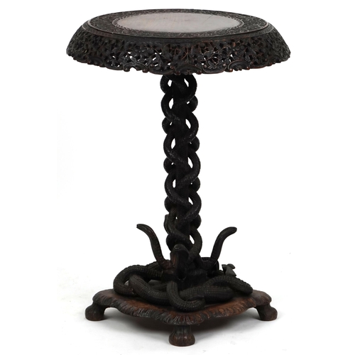  A good 19th century Anglo-Indian carved paddock tip-top centre table, the circular top with a pierce... 