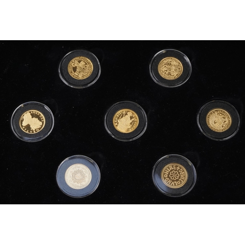 3362 - The Millionaire's Gold Edition coin collection comprising seven 22ct gold coins and eight silver coi... 