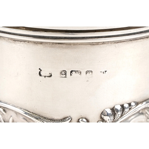 403 - A large Edwardian silver caster embossed with Putti amongst foliage, indistinct maker's mark, Birmin... 