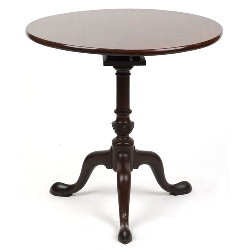 1046 - A late George III mahogany circular tip-top wine table, raised on tripod legs, H-71cm