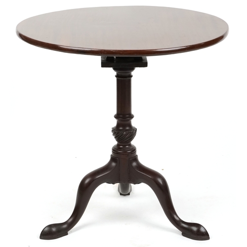 1046 - A late George III mahogany circular tip-top wine table, raised on tripod legs, H-71cm