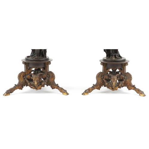  A near pair of 19th century French brown patinated bronze figural candelabras signed Pradier, James ... 