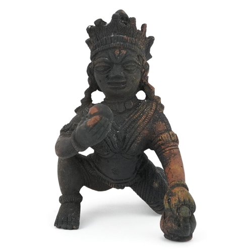 203 - A late 19th/early 20th century Indian bronze figure of a god on one knee, H-10cm.