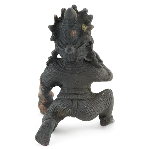 203 - A late 19th/early 20th century Indian bronze figure of a god on one knee, H-10cm.