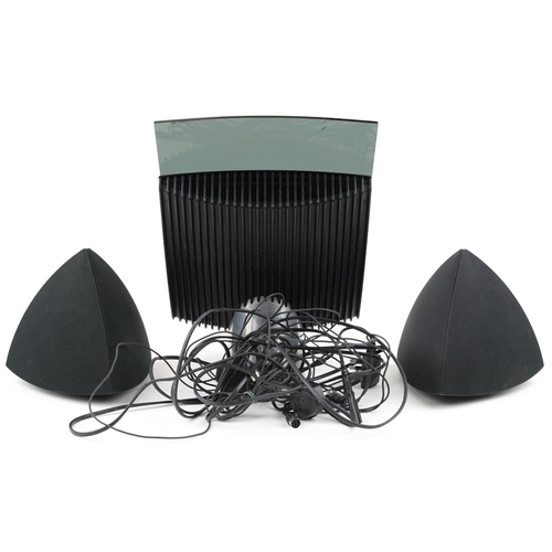 2015 - A Bang & Olufsen Beosound 4 music system with speakers and instructions.