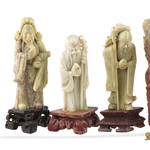 373 - A collection of 20th century Chinese stone carvings, some soapstone, including dogs of Foo, elders a... 