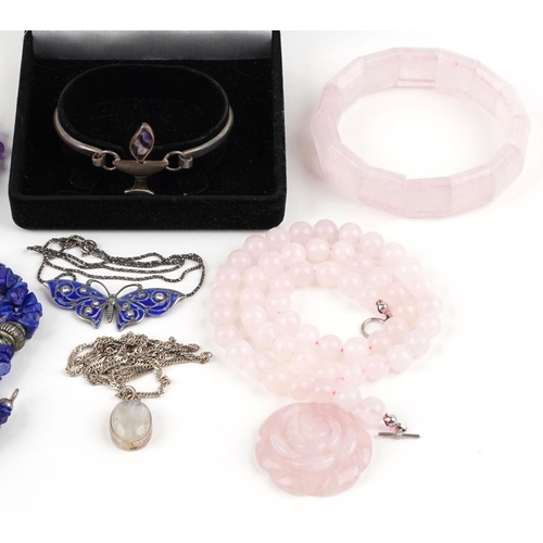 3334 - Polished stone jewellery including amethyst necklace, rose quartz necklace, enamelled butterfly neck... 