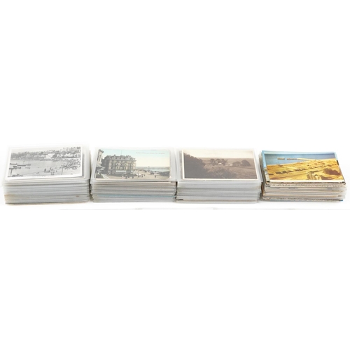 2263 - A collection of approximately four hundred topographic postcards including photographic, colour and ... 