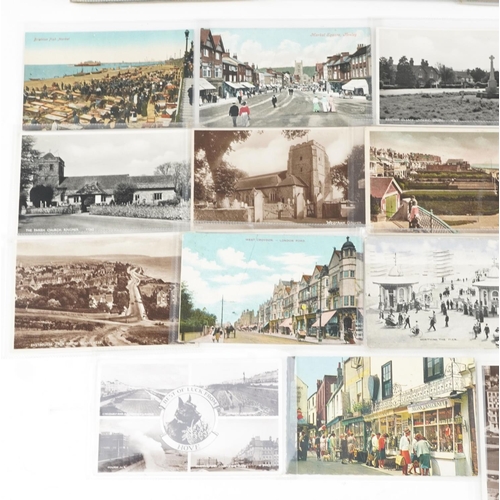 2263 - A collection of approximately four hundred topographic postcards including photographic, colour and ... 