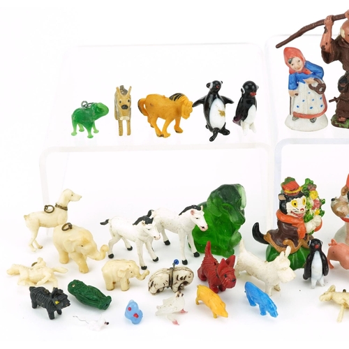 1300 - A small collection of plastic figures including animals and people.