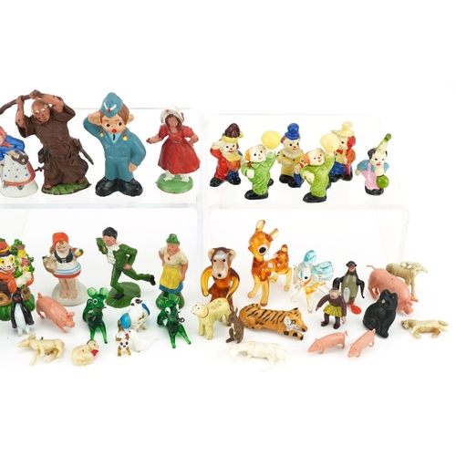 1300 - A small collection of plastic figures including animals and people.