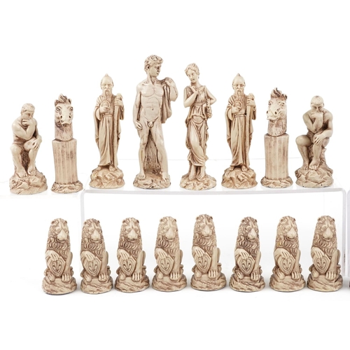 1317 - A modern resin chess set modelled as classical figures, the height of the king 15cm high.