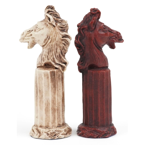 1317 - A modern resin chess set modelled as classical figures, the height of the king 15cm high.