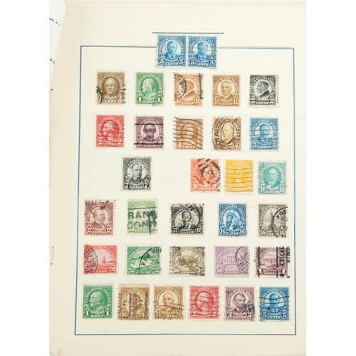 2215 - A selection of 19th century and later USA stamps on sheets.