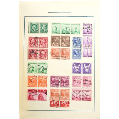 2215 - A selection of 19th century and later USA stamps on sheets.