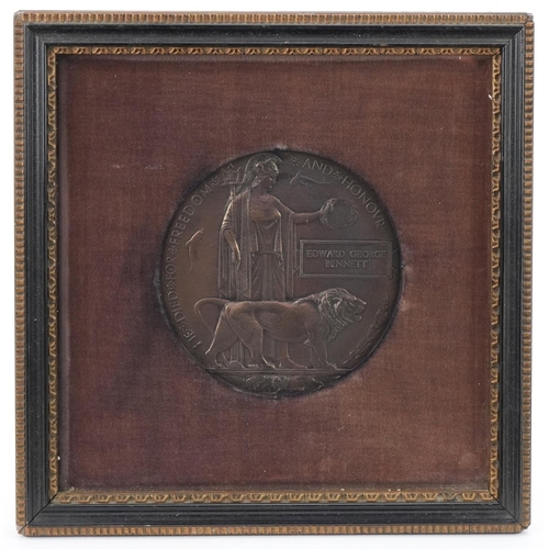 2443 - British military World War I death plaque awarded to Edward George Bennett housed in a glazed frame