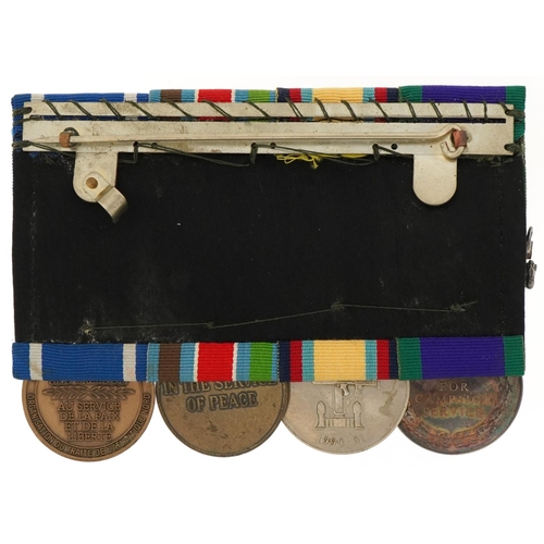 2428 - Four military medals with three bars and ribbons awarded to 24747312 LCPL L.TAYLOR.REME